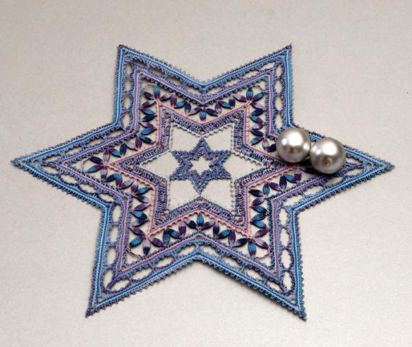 592 Klöppelbrief Deckchen Stern "Stella"